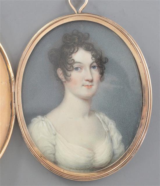 Early 19th century English School Miniature portrait of a young lady 2.5 x 2in. gold locket frame.